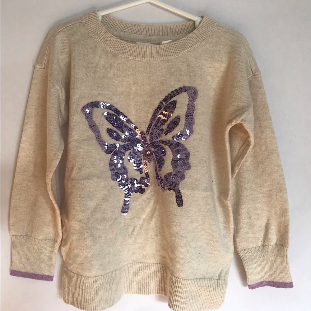 Gap kids girl sweater with butterfly embroidered on front.